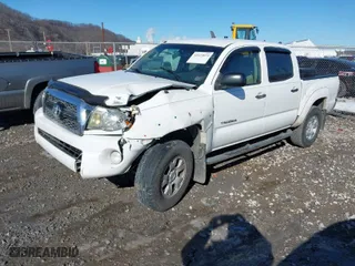 2011 Toyota Tacoma with VIN 3TMLU4EN0BM064052, listed as a IAAI auction lot 41423819 with 185,729 mi miles. Bid and sale history available at carsss.com. Image 2.
