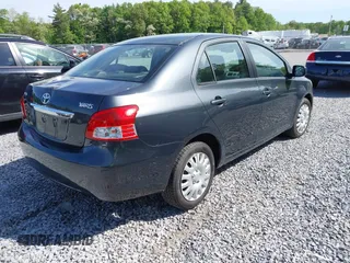 2009 Toyota Yaris z VIN JTDBT903094048800, wystawiony jako IAAI lot #42375049 z przebiegiem 168 478 mil mil oraz . Historia ofert i sprzedaży dostępna na DreamBid. Obrazek 4.