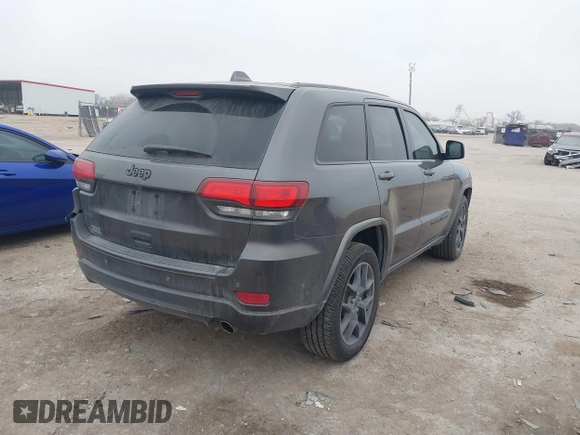2021 Jeep Grand Cherokee 80th Anniversary z VIN 1C4RJFBGXMC621817, wystawiony jako IAAI lot #41519733 z przebiegiem 60 552 mil mil oraz . Historia ofert i sprzedaży dostępna na DreamBid. Obrazek 4.