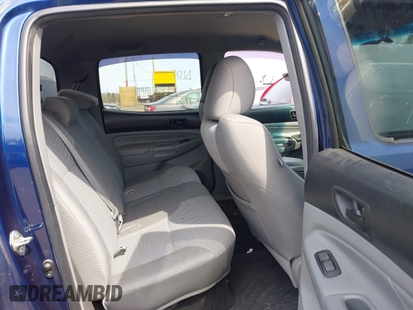 2014 Toyota Tacoma with VIN 3TMLU4EN0EM153558, listed as a IAAI auction lot 41964890 with 140,864 mi miles and . Bid and sale history available at DreamBid. Image 8.