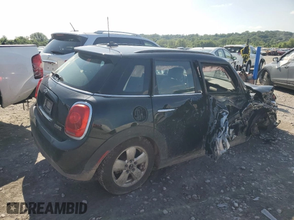 2017 MINI Hardtop 4 Door Cooper с VIN WMWXU1C39H2F92805, выставлен на аукционе Copart как лот 61665635 с пробегом 74 295 миль миль и Списание • Salvage title. История ставок и продаж доступна на DreamBid. Изображение 3.