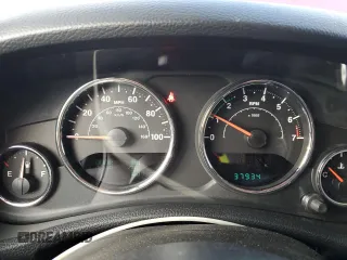 2013 Jeep Wrangler Rubicon с VIN 1C4HJWCG8DL520639, выставлен на аукционе Copart как лот 42458815 с пробегом 37 934 миль миль и Списание • Salvage title. История ставок и продаж доступна на DreamBid. Изображение 9.