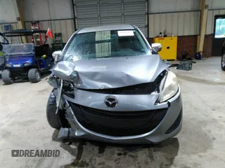 2013 Mazda 5 Sport with VIN JM1CW2BL5D0156684, listed as a IAAI auction lot 41966696 with 121,654 mi miles and . Bid and sale history available at DreamBid. Image 13.