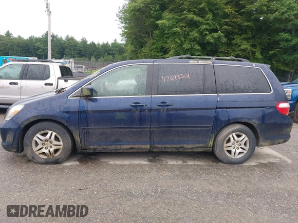2005 Honda Odyssey EX-L with VIN 5FNRL38725B001662, listed as a IAAI auction lot 42693301 with 161,114 mi miles and . Bid and sale history available at DreamBid. Image 12.