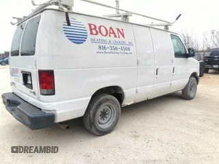 2011 Ford Econoline Cargo Commercial with VIN 1FTNE1EWXBDA35683, listed as a IAAI auction lot 41341685 with 137,031 mi miles and . Bid and sale history available at DreamBid. Image 4.