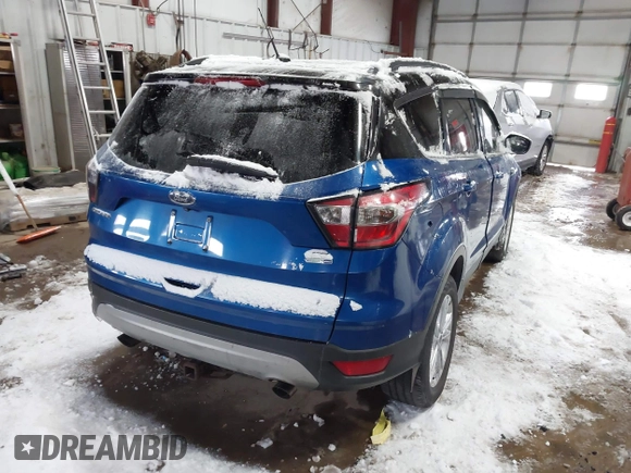 2017 Ford Escape SE with VIN 1FMCU9GD0HUD61453, listed as a IAAI auction lot 41596562 with 173,803 mi miles and . Bid and sale history available at DreamBid. Image 4.