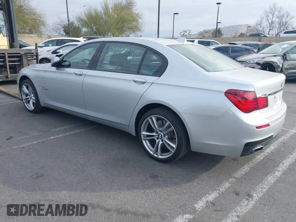 2015 BMW 7 Series 750Li with VIN WBAYE8C5XFD782039, listed as a IAAI auction lot 41505626 with 74,716 mi miles. Bid and sale history available at carsss.com. Image 3.