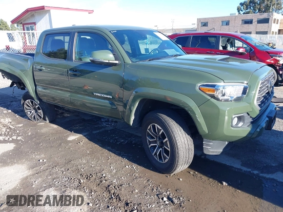 2021 Toyota Tacoma SR with VIN 3TMCZ5AN7MM395940, listed as a IAAI auction lot 41240832 with 39,338 mi miles and . Bid and sale history available at DreamBid. Image 1.