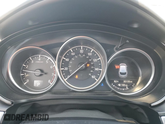 2016 Mazda CX-9 Grand Touring with VIN JM3TCADY6G0104553, listed as a Copart auction lot 50372345 with 35,133 mi miles and Salvage Title. Bid and sale history available at DreamBid. Image 9.