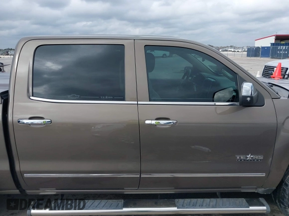 2015 Chevrolet Silverado 1500 LTZ with VIN 3GCPCSEC6FG408754, listed as a IAAI auction lot 41514369 with 140,928 mi miles and . Bid and sale history available at DreamBid. Image 13.