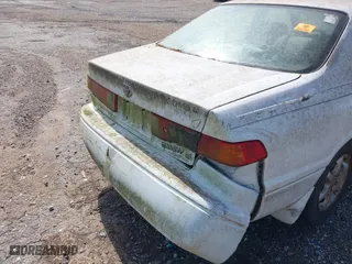 2000 Toyota Camry CE with VIN JT2BG22K3Y0471420, listed as a IAAI auction lot 42042973 with 1 mi miles. Bid and sale history available at carsss.com. Image 6.