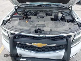 2018 Chevrolet Tahoe Commercial z VIN 1GNSKDEC8JR242164, wystawiony jako IAAI lot #42779273 z przebiegiem 134 654 mil mil oraz . Historia ofert i sprzedaży dostępna na DreamBid. Obrazek 10.