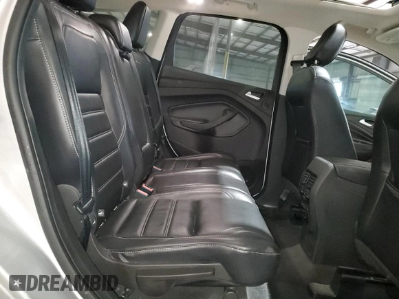 2019 Ford Escape Titanium with VIN 1FMCU0J96KUB77741, listed as a Copart auction lot 57517325 with 90,002 mi miles and Non repairable. Bid and sale history available at DreamBid. Image 11.