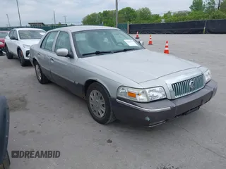 2007 Mercury Grand Marquis GS z VIN 2MEFM74V97X612947, wystawiony jako IAAI lot #42353737 z przebiegiem Nie podano mil oraz . Historia ofert i sprzedaży dostępna na DreamBid. Obrazek 1.