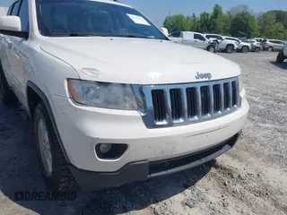 2011 Jeep Grand Cherokee Laredo with VIN 1J4RS4GG5BC573337, listed as a IAAI auction lot 41960369 with 185,518 mi miles and . Bid and sale history available at DreamBid. Image 6.