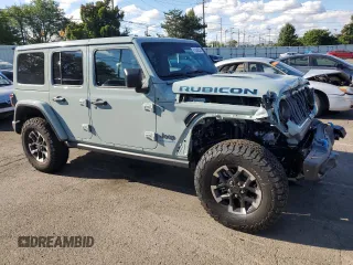 2024 Jeep Wrangler Rubicon z VIN 1C4RJXR64RW279791, wystawiony jako Copart lot #61348324 z przebiegiem 1 387 mil mil oraz Szkoda całkowita • Salvage title. Historia ofert i sprzedaży dostępna na DreamBid. Obrazek 4.