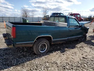 1997 GMC Sierra 1500 SL with VIN 1GTEC14WXVZ505001, listed as a Copart auction lot 53973435 with 217,305 mi miles and Non Repairable. Bid and sale history available at DreamBid. Image 3.