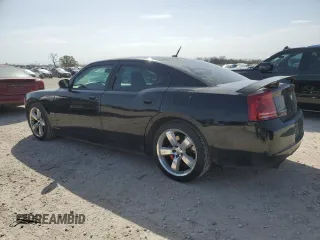 2008 Dodge Charger SRT-8 with VIN 2B3KA73W48H284076, listed as a Copart auction lot 48109825 with 156,174 mi miles and Salvage Title. Bid and sale history available at carsss.com. Image 2.