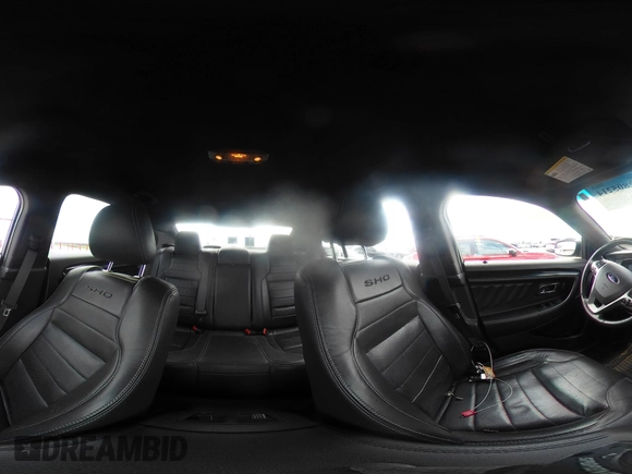 2014 Ford Taurus SHO with VIN 1FAHP2KT1EG133940, listed as a IAAI auction lot 42805214 with 141,204 mi miles and . Bid and sale history available at DreamBid. Image 18.