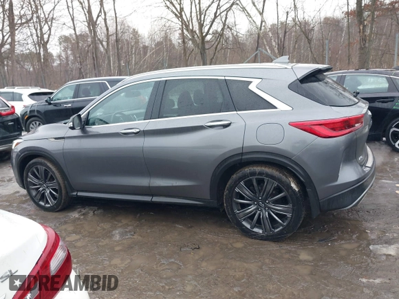 2020 Infiniti QX50 Essential with VIN 3PCAJ5M36LF109877, listed as a IAAI auction lot 41552926 with 62,486 mi miles and . Bid and sale history available at DreamBid. Image 14.
