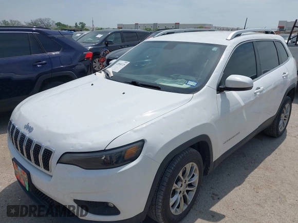 2019 Jeep Cherokee Latitude Plus with VIN 1C4PJLLBXKD220221, listed as a IAAI auction lot 42060125 with 89,452 mi miles and . Bid and sale history available at DreamBid. Image 6.
