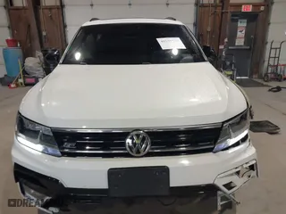 2020 Volkswagen Tiguan SE with VIN 3VV2B7AX1LM106600, listed as a IAAI auction lot 40259436 with 56,736 mi miles. Bid and sale history available at carsss.com. Image 12.