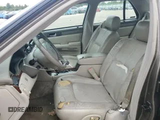 2002 Cadillac Seville Luxury SLS z VIN 1G6KS54Y72U218452, wystawiony jako Copart lot #71632784 z przebiegiem 99 563 mil mil oraz Szkody całkowita. Historia ofert i sprzedaży dostępna na DreamBid. Obrazek 7.