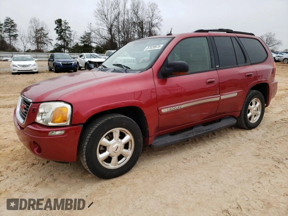 2004 GMC Envoy SLT with VIN 1GKDT13S342262833, listed as a Copart auction lot 87828975 with 203,404 mi miles and Salvage Title. Bid and sale history available at carsss.com. Image 1.
