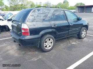 2005 Acura MDX Touring with VIN 2HNYD18675H509683, listed as a IAAI auction lot 42034695 with 236,865 mi miles. Bid and sale history available at carsss.com. Image 4.
