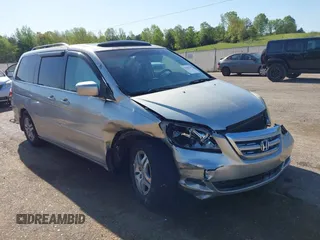 2005 Honda Odyssey EX-L z VIN 5FNRL38715B014905, wystawiony jako IAAI lot #41986395 z przebiegiem 191 029 mil mil oraz . Historia ofert i sprzedaży dostępna na DreamBid. Obrazek 6.