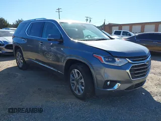 2020 Chevrolet Traverse Premier with VIN 1GNERKKW3LJ128117, listed as a IAAI auction lot 41857067 with 77,700 mi miles and . Bid and sale history available at DreamBid. Image 1.