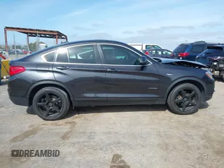 2015 BMW X4 xDrive28i z VIN 5UXXW3C54F0M87412, wystawiony jako IAAI lot #42038938 z przebiegiem 106 461 mil mil oraz . Historia ofert i sprzedaży dostępna na DreamBid. Obrazek 13.