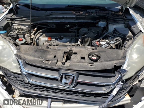2010 Honda CR-V LX z VIN 5J6RE4H32AL034997, wystawiony jako Copart lot #60868905 z przebiegiem 99 469 mil mil oraz Czysty tytuł • Clean title. Historia ofert i sprzedaży dostępna na DreamBid. Obrazek 12.