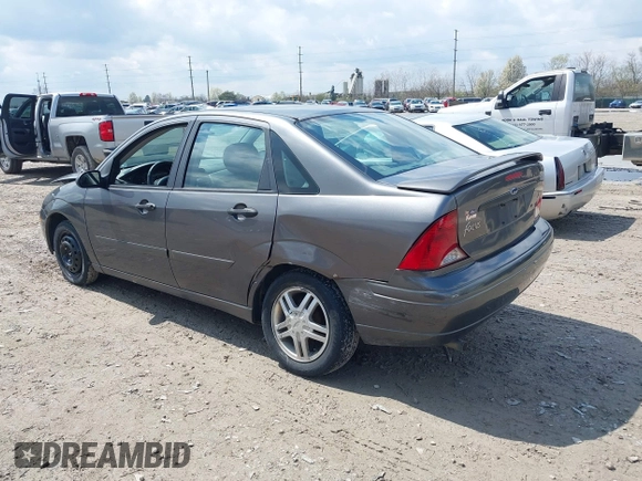 2004 Ford Focus SE with VIN 1FAFP34334W177338, listed as a IAAI auction lot 42003202 with 190,581 mi miles and . Bid and sale history available at DreamBid. Image 3.
