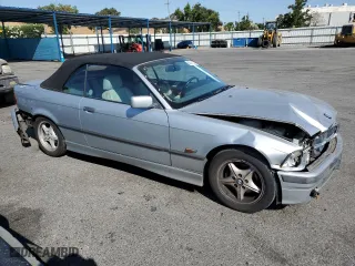 1996 BMW 3-Series 328IC with VIN WBABK8328TET91062, listed as a Copart auction lot 66011034 with 0 mi miles and Salvage Title. Bid and sale history available at carsss.com. Image 4.