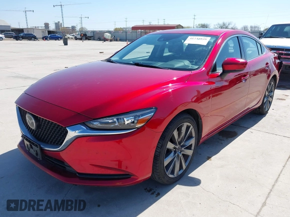 2020 Mazda 6 Grand Touring with VIN JM1GL1TY7L1511054, listed as a IAAI auction lot 41734848 with 70,573 mi miles and . Bid and sale history available at carsss.com. Image 18.