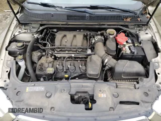 2013 Ford Taurus Limited with VIN 1FAHP2F8XDG198564, listed as a Copart auction lot 51377105 with 141,252 mi miles and Salvage Title. Bid and sale history available at DreamBid. Image 12.