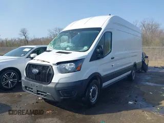 2022 Ford Transit Cargo with VIN 1FTBW3X81NKA04543, listed as a IAAI auction lot 41763336 with 128,518 mi miles. Bid and sale history available at carsss.com. Image 2.