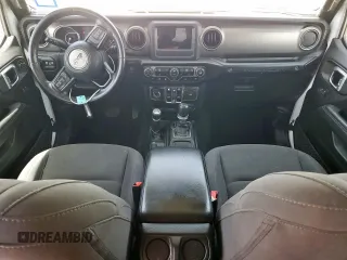 2019 Jeep Wrangler Unlimited Sport S with VIN 1C4HJXDG7KW533575, listed as a Copart auction lot 57068125 with 77,669 mi miles and Salvage title. Bid and sale history available at DreamBid. Image 8.