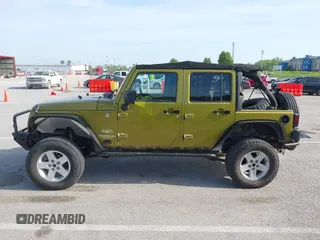 2007 Jeep Wrangler Unlimited Sahara with VIN 1J4GA59177L182593, listed as a IAAI auction lot 42104934 with 158,990 mi miles and . Bid and sale history available at DreamBid. Image 14.