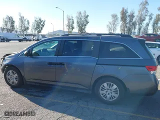 2014 Honda Odyssey LX with VIN 5FNRL5H23EB015067, listed as a IAAI auction lot 41760301 with 167,389 mi miles. Bid and sale history available at carsss.com. Image 14.