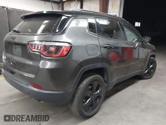 2018 Jeep Compass Latitude with VIN 3C4NJCBB2JT327376, listed as a IAAI auction lot 42382050 with 91,678 mi miles and . Bid and sale history available at DreamBid. Image 4.