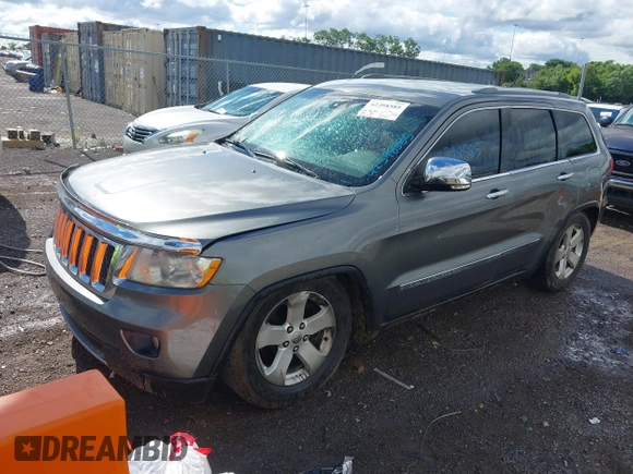 2011 Jeep Grand Cherokee Overland Summit with VIN 1J4RR6GT3BC713812, listed as a IAAI auction lot 42398585 with 208,476 mi miles and . Bid and sale history available at DreamBid. Image 17.