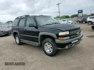 2003 Chevrolet Tahoe Z71 z VIN 1GNEK13Z13R301464, wystawiony jako Copart lot #53905395 z przebiegiem 165 360 mil mil oraz Szkoda całkowita • Salvage title. Historia ofert i sprzedaży dostępna na DreamBid. Obrazek 14.