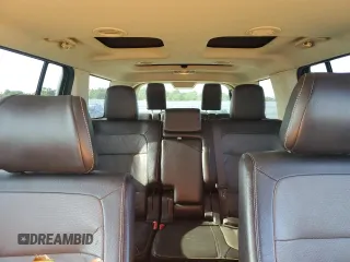 2014 Ford Flex SEL z VIN 2FMGK5C86EBD41038, wystawiony jako Copart lot #55609235 z przebiegiem 157 934 mil mil oraz Szkoda całkowita • Salvage title. Historia ofert i sprzedaży dostępna na DreamBid. Obrazek 10.