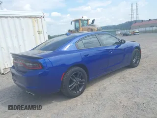 2019 Dodge Charger SXT with VIN 2C3CDXJG4KH550424, listed as a IAAI auction lot 40224159 with 56,988 mi miles and . Bid and sale history available at DreamBid. Image 4.