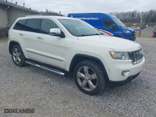 2012 Jeep Grand Cherokee Overland with VIN 1C4RJFCGXCC263065, listed as a IAAI auction lot 41942110 with 189,681 mi miles. Bid and sale history available at carsss.com. Image 1.