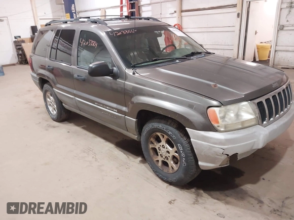 2000 Jeep Grand Cherokee Laredo z VIN 1J4GW48S1YC277710, wystawiony jako IAAI lot #42033564 z przebiegiem Nie podano mil oraz . Historia ofert i sprzedaży dostępna na DreamBid. Obrazek 1.