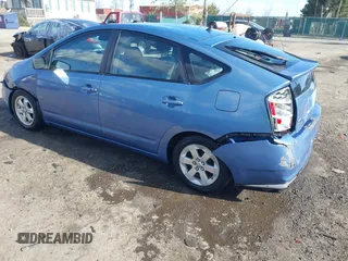 2006 Toyota Prius with VIN JTDKB20U167073069, listed as a IAAI auction lot 41886556 with 122,945 mi miles. Bid and sale history available at carsss.com. Image 3.