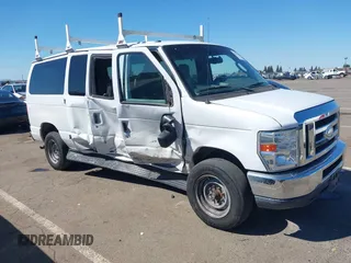 2014 Ford Econoline Passenger XL with VIN 1FBNE3BL7EDA37146, listed as a IAAI auction lot 41871526 with 139,387 mi miles. Bid and sale history available at carsss.com. Image 1.